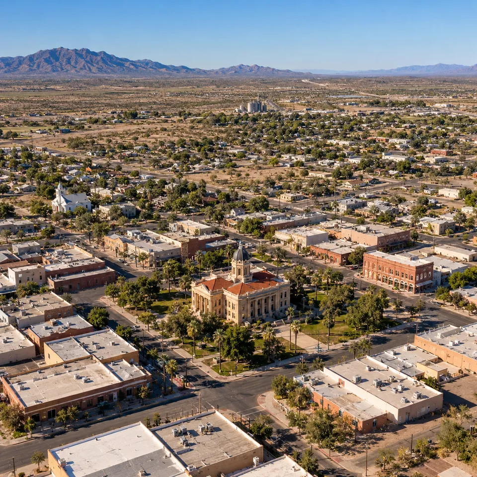 Aerial drone view of the historic Pinal County Courthouse dome in downtown Florence, Arizona.
